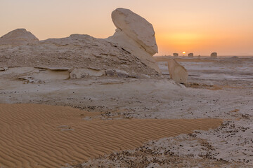 Sunset view of the chalk rock formations in the White Desert, Egypt