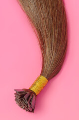 closeup of flat tip adhere fusion straight brown human hair extensions 