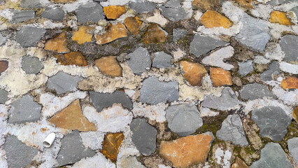 Textured background of stone walls in the tourist area of Cicalengka