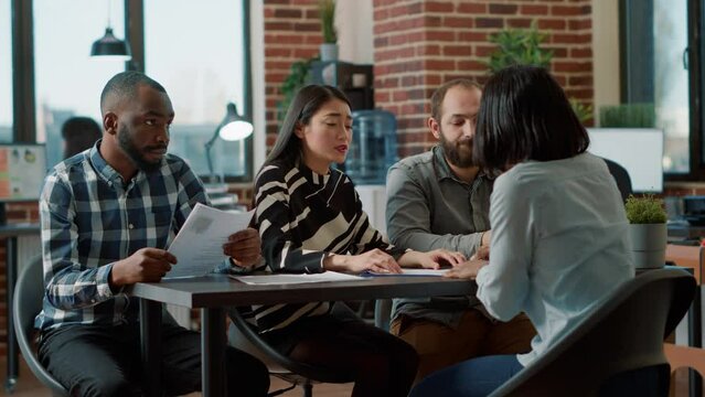 Angry woman leaving job meeting after getting dismissed, losing employment. Shocked person in despair being fired from office work, feeling worried about failed business career.
