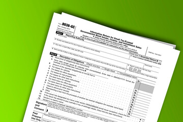 Obraz premium Form 8038-GC documentation published IRS USA 44206. American tax document on colored