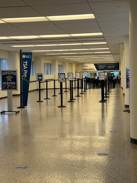 Passengers at TSA security screening line inside main terminal General Mitchell International Airport in Milwaukee, Wisconsin on a Sunday.