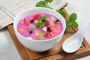 Es buah or sop buah-is an Indonesian iced fruit cocktail dessert. This cold and sweet beverage is...