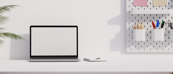 Comfortable workspace office desk with portable notebook laptop