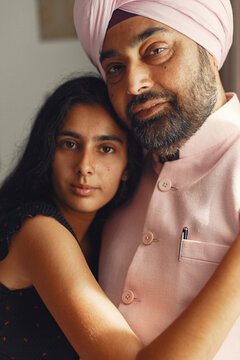 Portrait Of Indian Sikh Man In Turban With Daughter