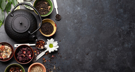 Various dried tea and teapot