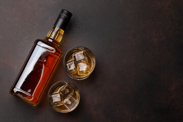 Scotch whiskey bottle and glasses