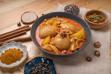 Chicken Yellow Curry or Massaman Curry with Chicken, Chicken curry cooked in coconut milk with curry paste spices and potatoes.