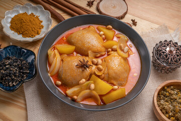 Chicken Yellow Curry or Massaman Curry with Chicken, Chicken curry cooked in coconut milk with curry paste spices and potatoes.