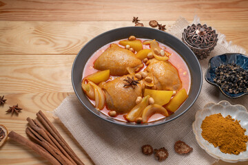 Chicken Yellow Curry or Massaman Curry with Chicken, Chicken curry cooked in coconut milk with curry paste spices and potatoes.