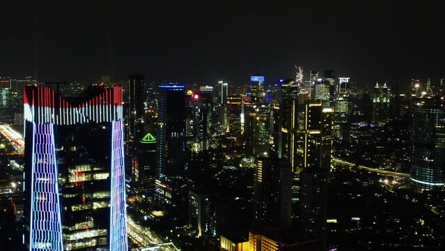 Beautiful glowing highrise at night time in Jakarta
