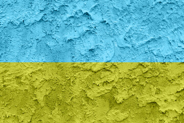 Ukraine flag blue and yellow colors on concrete texture
