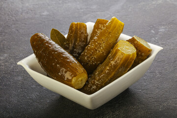 Marinated pickled cucumbers in the bowl