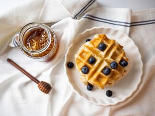 Delicious homemade waffle toping with blueberries