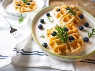 Delicious homemade waffle toping with blueberries