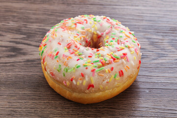 Sweet glazed vanilla donut with icing