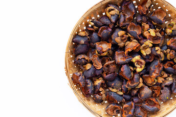 Dried mangosteen peel on white background.