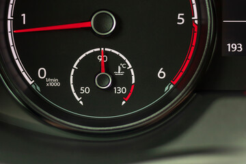 car. the dashboard. engine coolant temperature indicator. close-up.