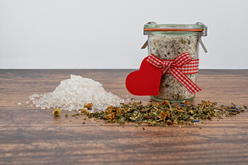 Homemade bath salts in a glass container