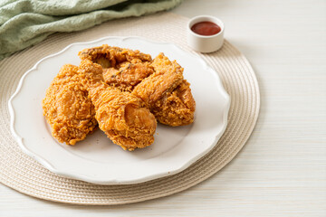 fried chicken with ketchup on plate
