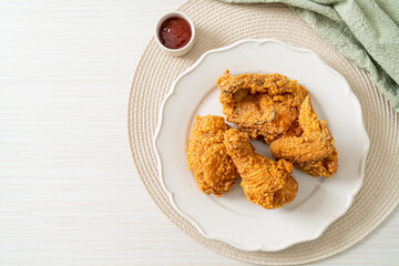 fried chicken with ketchup on plate