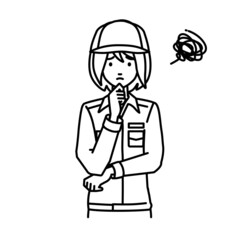 立って手をあごにあてて困っている作業員の女性