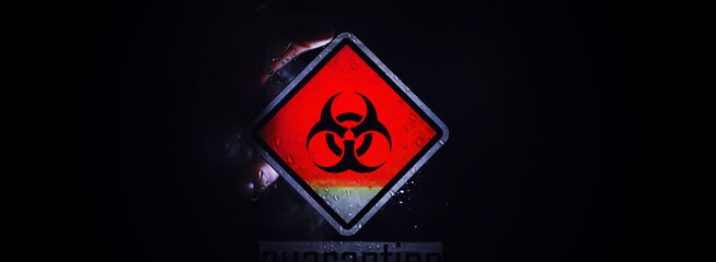 Quarantine. Quarantine warning sign on a glass door in a hospital isolator. Isolation of patients...