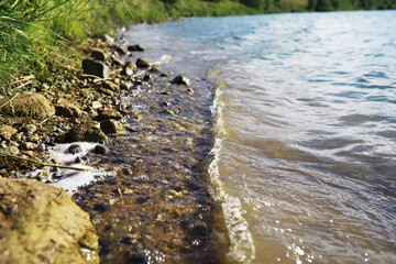 Water surface. The texture of the water. Waves on the lake in windy weather.