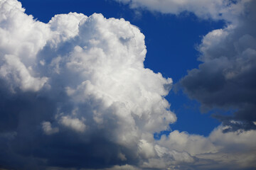 High clouds in the summer sky. Sky background. Meteorological observations of the sky.