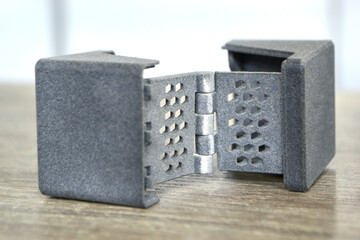 Gray abstract model object printed on 3d printer from powder close-up. 3D prototype created by 3d...