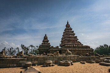 Fototapeta premium Shore temple built by Pallavas is UNESCO`s World Heritage Site located at Mamallapuram or Mahabalipuram in Tamil Nadu, South India. Very ancient place in the world.