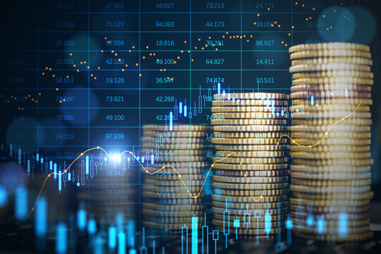 Abstract image of growing coin stacks and candlestick forex chart on blurry backdrop. Trade, money and financial growth concept. Double exposure.