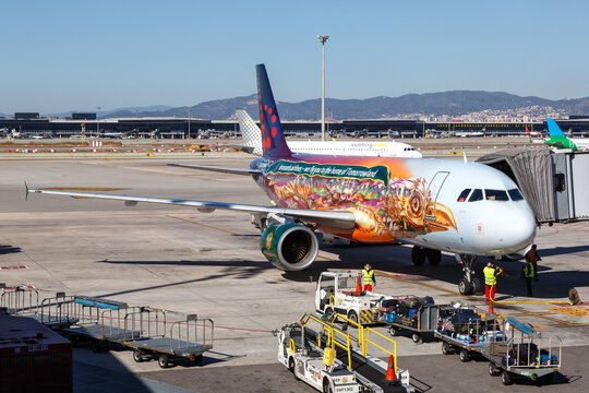 Brussels Airlines Airbus A320 airplane Barcelona airport in Spain Tomorrowland special livery