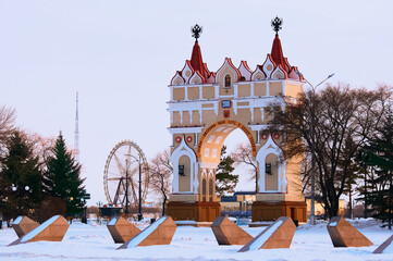 Triumphal arch in Blagoveshchensk, Russia. It was built in 1891 In honor of Crown Prince Nikolai Alexandrovich. In 1936 it was destroyed by a flood. And rebuilt in 2005. Sunlight on a winter evening