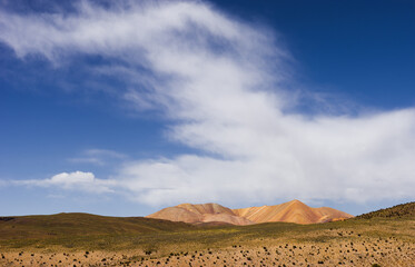 Fototapeta na wymiar cloudscape over a volcano in Lauce National Park, Chile