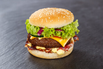 Hamburger Cheeseburger fastfood fast food on a slate