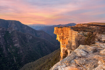 Magnificent cliff escarpment and deep valley views with sunset sky