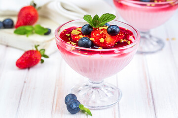 Strawberry Cream Dessert with some blueberries. Delicious strawberry pudding.