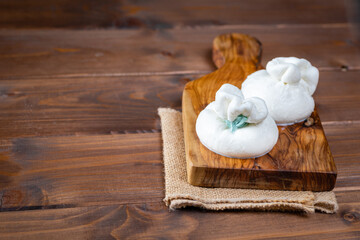 Italian burrata cheese made from mozzarella with cream inside from south italy