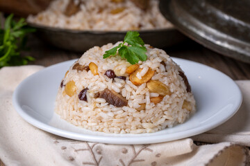 Food from traditional Turkish cuisine; Meat, Almond Stuffed Pilaf (Turkish name; ic pilavi, ic pilav)