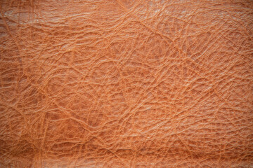 Genuine leather texture background. Dark brown, orange textures for decoration blank. Vintage skin natural suede.