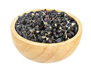 Dried Black wolfberries or black goji berries in wooden bowl isolated on white background.