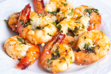Skewered grilled shrimp with sauce