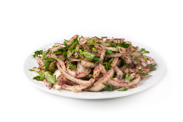 Turkish onion salad is served with kebab  accompanied by lemon and parsley.
