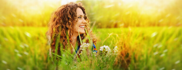 Pretty smiling girl relaxing outdoor