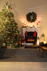 Cozy room interior with beautiful Christmas tree and fireplace
