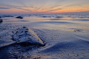 rocks in the sea at sunset