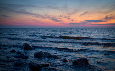 rocks in the sea at sunset