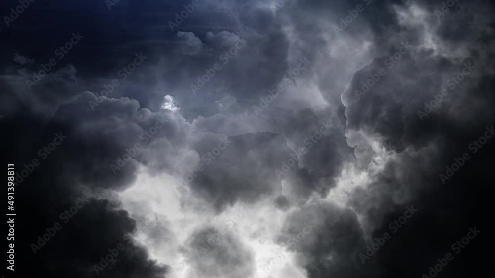 Poster epic thunderstorm moving clouds at night with lightning seamless loop.