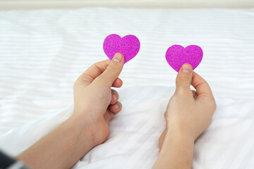 Hearts in hands on a white background. Congratulations on Valentine's Day.